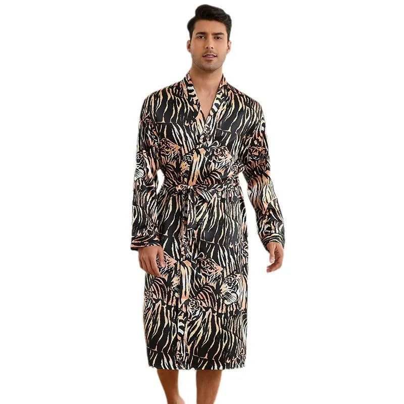 Men's tiger pattern print bathrobe and matching shorts set laid flat.
