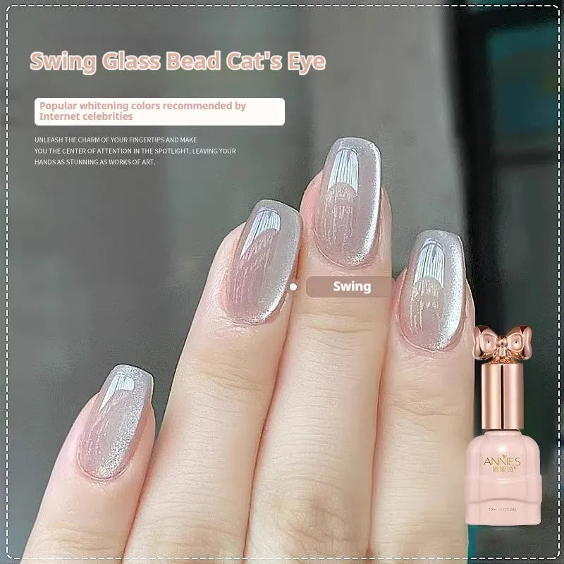 Micro glass bead cat's eye gel nail polish bottle showing cat's eye visual effect