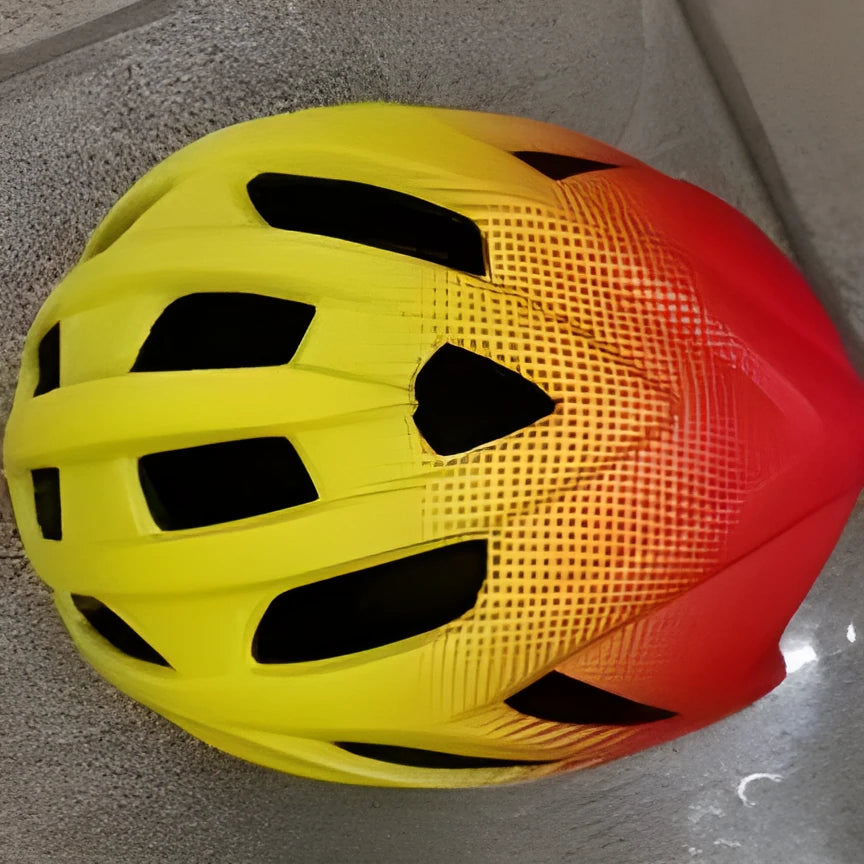 Orange lightweight bicycle helmet for road and mountain biking, showing ventilation holes.