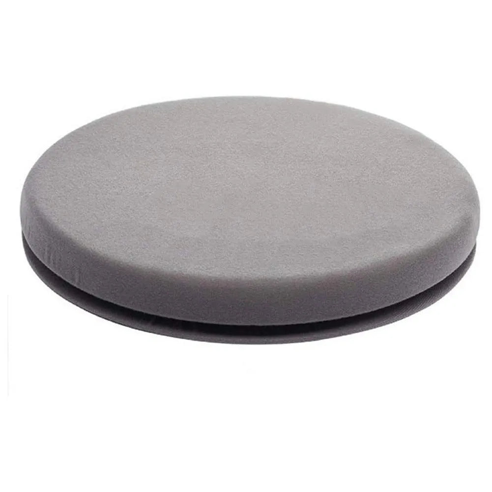 360-degree rotating car seat cushion with non-slip base and plush fabric cover.
