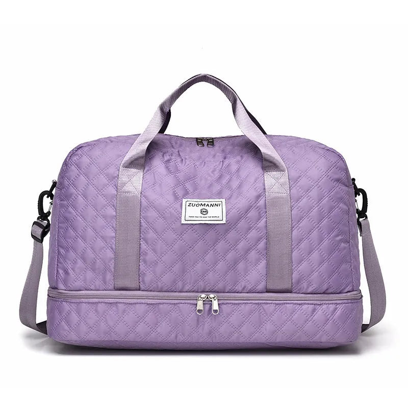 Large Oxford cloth travel holdall in a solid colour, shown with a capacity of 36-55 litres for buggies and luggage.