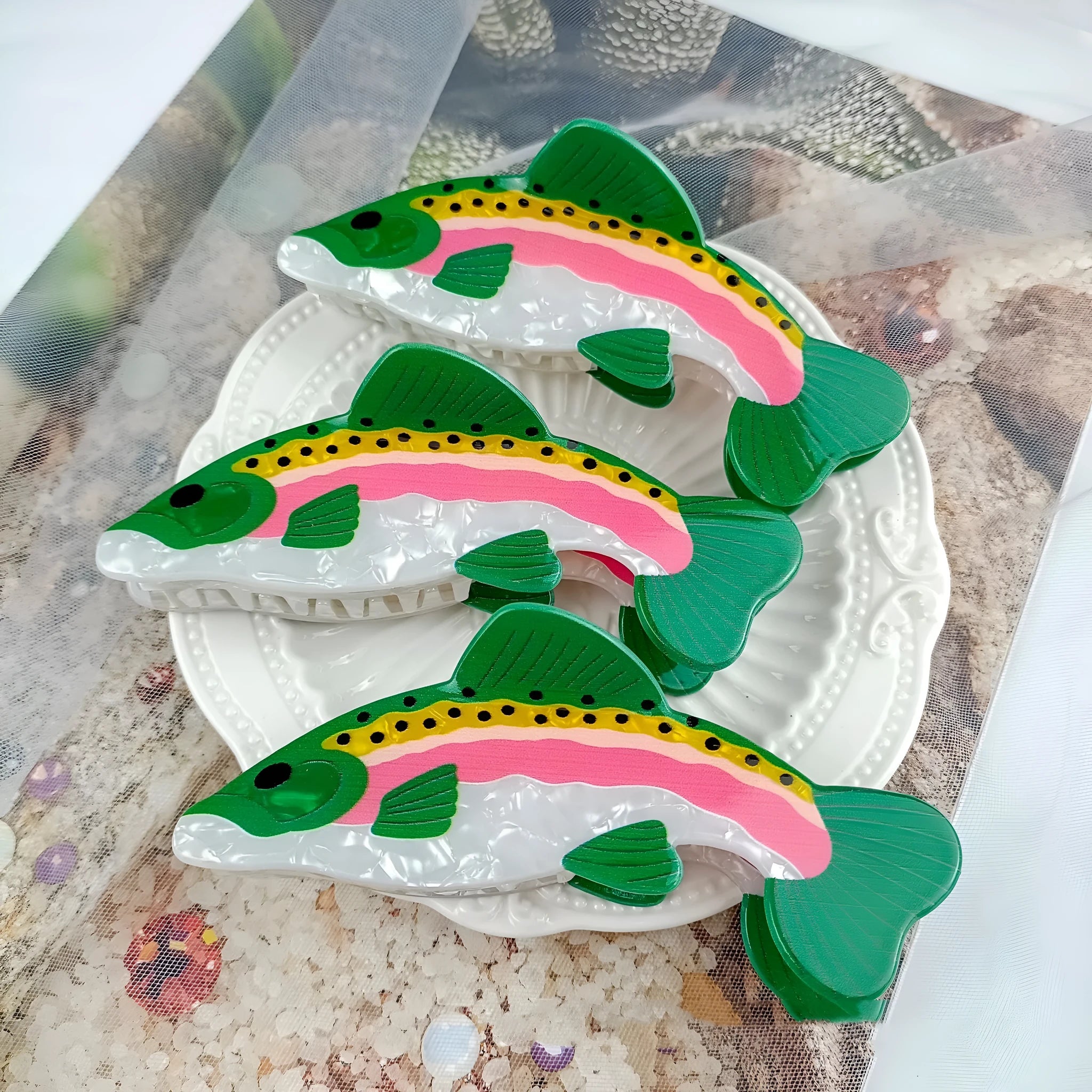 Dark green PVC hair clip with printed rainbow trout and carp design