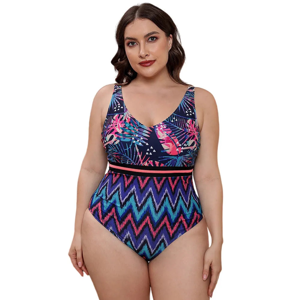 Women's blue printed one-piece swimsuit with spaghetti straps and a striped vest design on a mannequin.