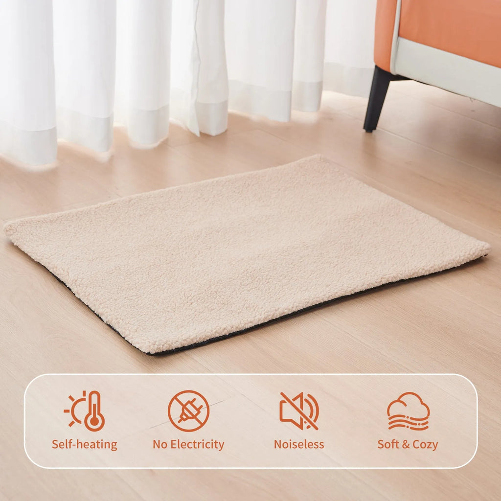 Grey self-heating plush pet pad for cats and dogs on a wooden floor