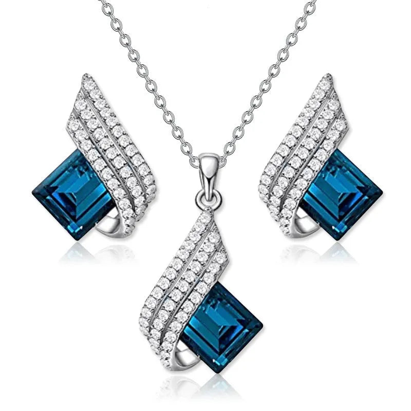 Alloy necklace with glass pendant and matching ear studs featuring cross chain design in jewellery set