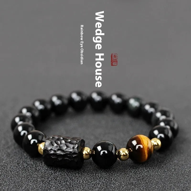 Obsidian bracelet with yellow tiger eye beads showing retro circular design