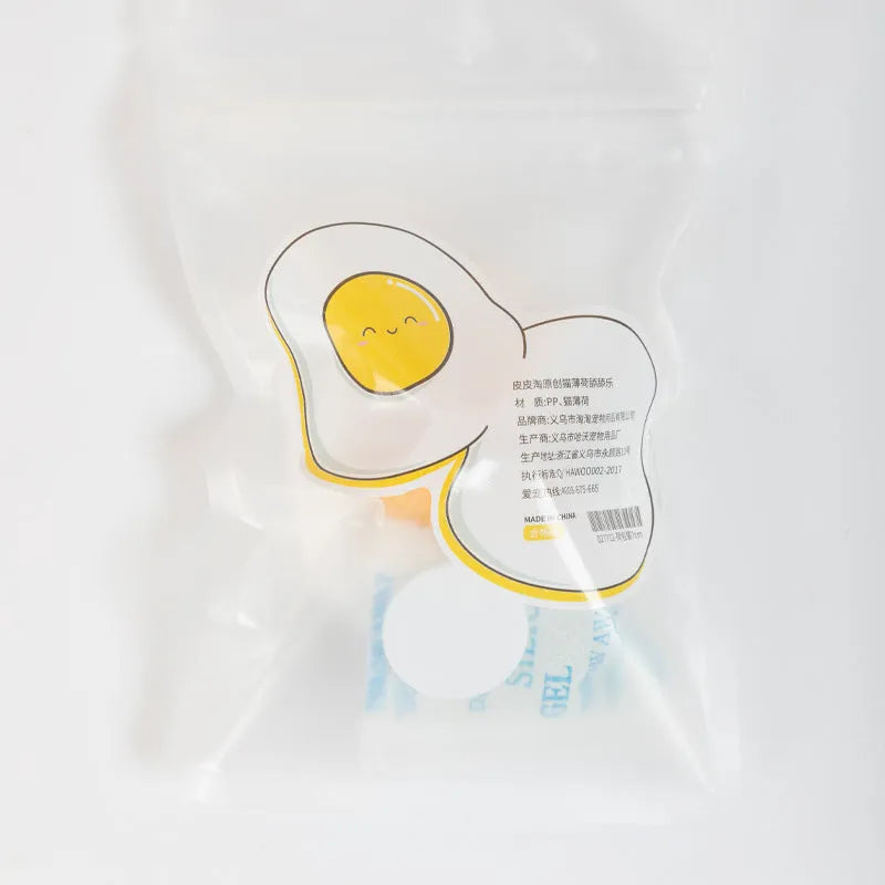 Soft plush egg-shaped cat toy filled with catnip and silvervine for wall and floor play.