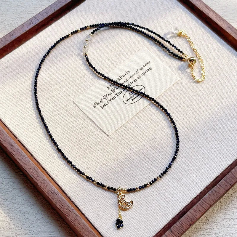 Blue gold three-ring women's bracelet with blue sand stone gemstone on adjustable fastening