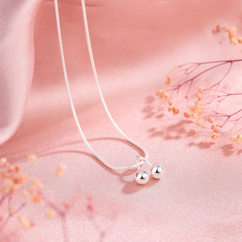 S925 silver adjustable necklace with a cherry pendant on a snake bone chain.