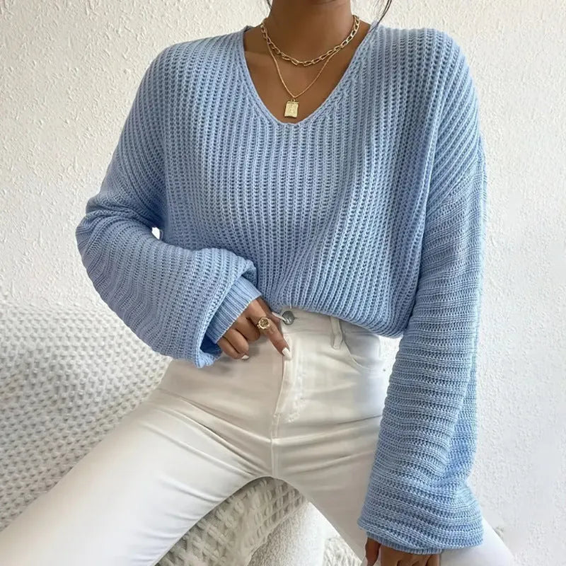 Women's solid colour long sleeve polyester pullover in a loose casual fit.