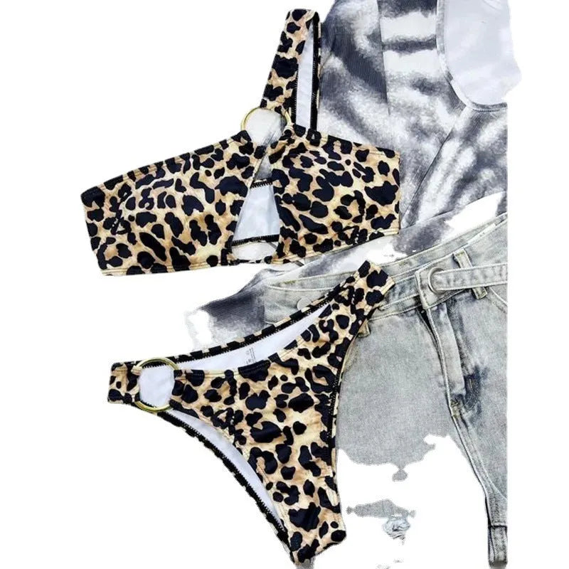 Women's leopard print polka dot bikini top and shorts set on a mannequin