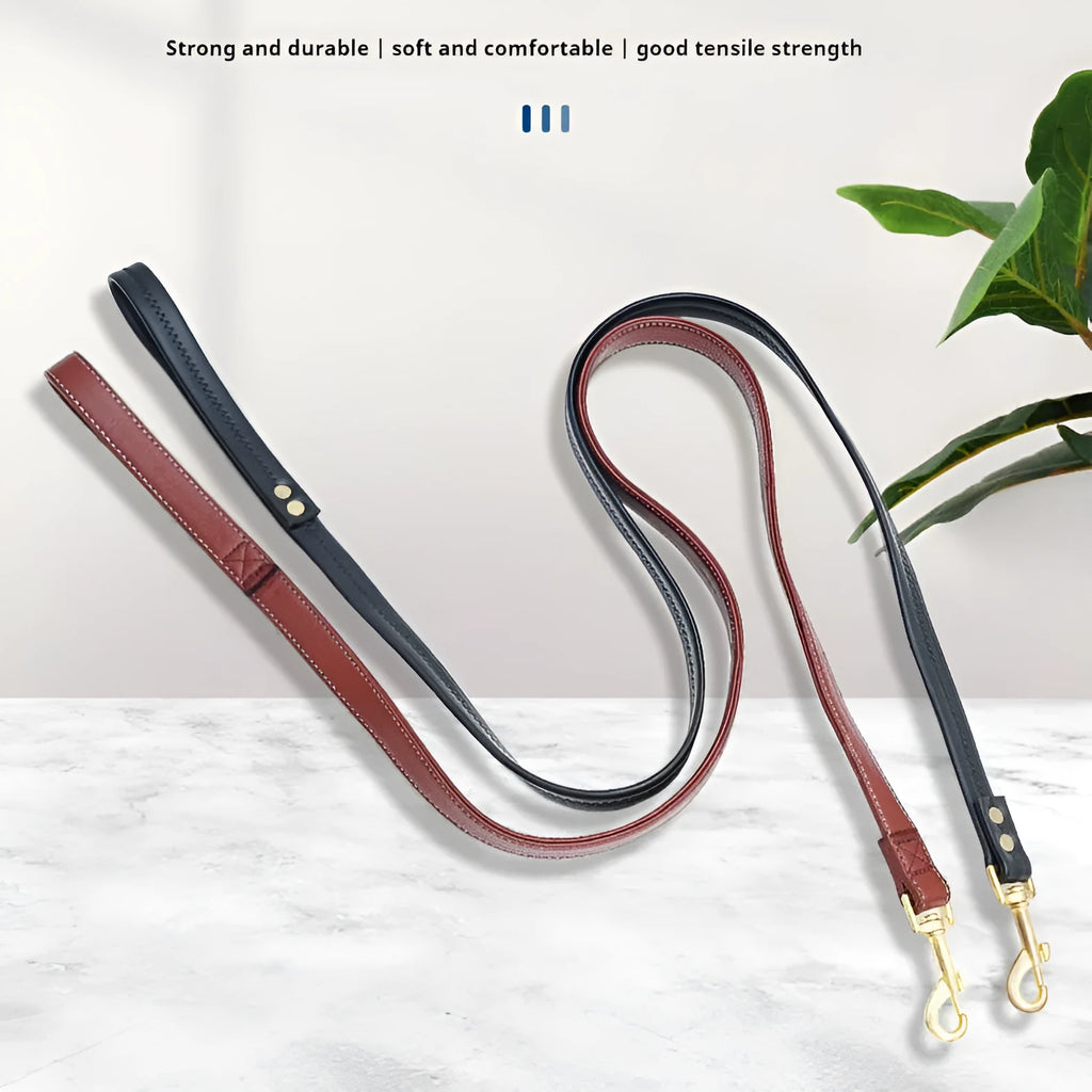 Black high-grade PU leather dog traction belt with a metal ring, shown alongside its attached rope.