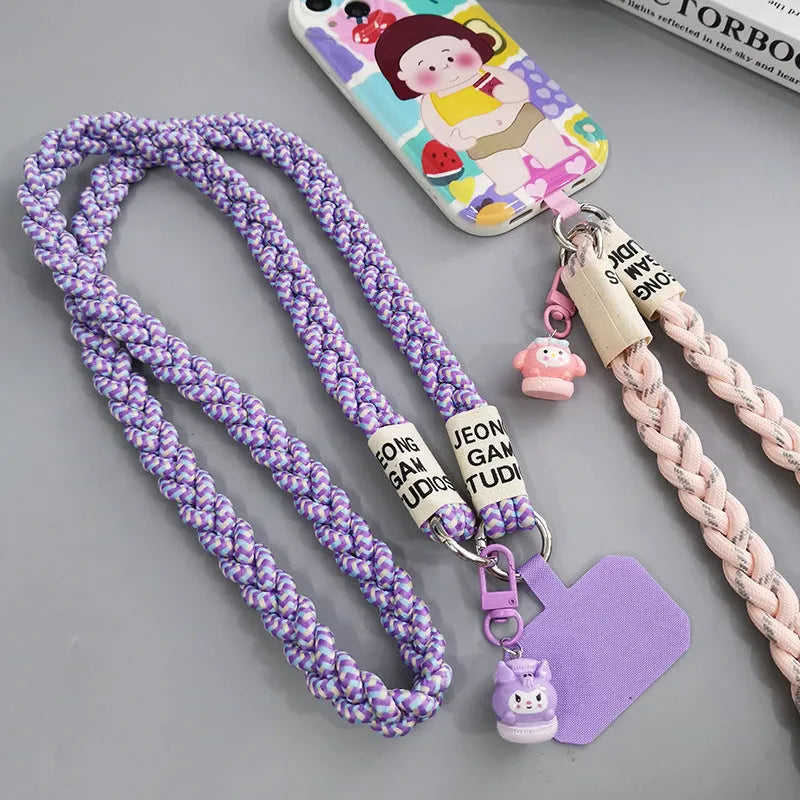 Woven nylon crossbody phone lanyard with macaron pendant in Pink Dot Gray, showing three-strand horse tail detail and matching clip.