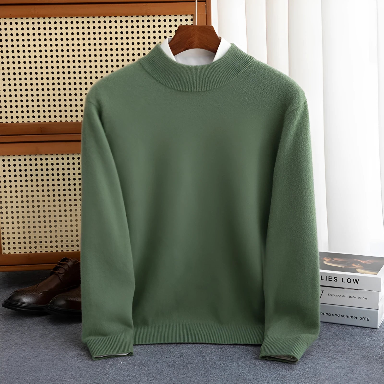 Men's half-collar wool sweater in loose fit showing half-turtleneck collar and regular sleeve design.