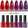 Set of 20 bottles of UV gel nail polish in various solid, glitter, and sequin colours.