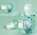 Colourful geometric mushroom ornament made of white crystal in four colour options.