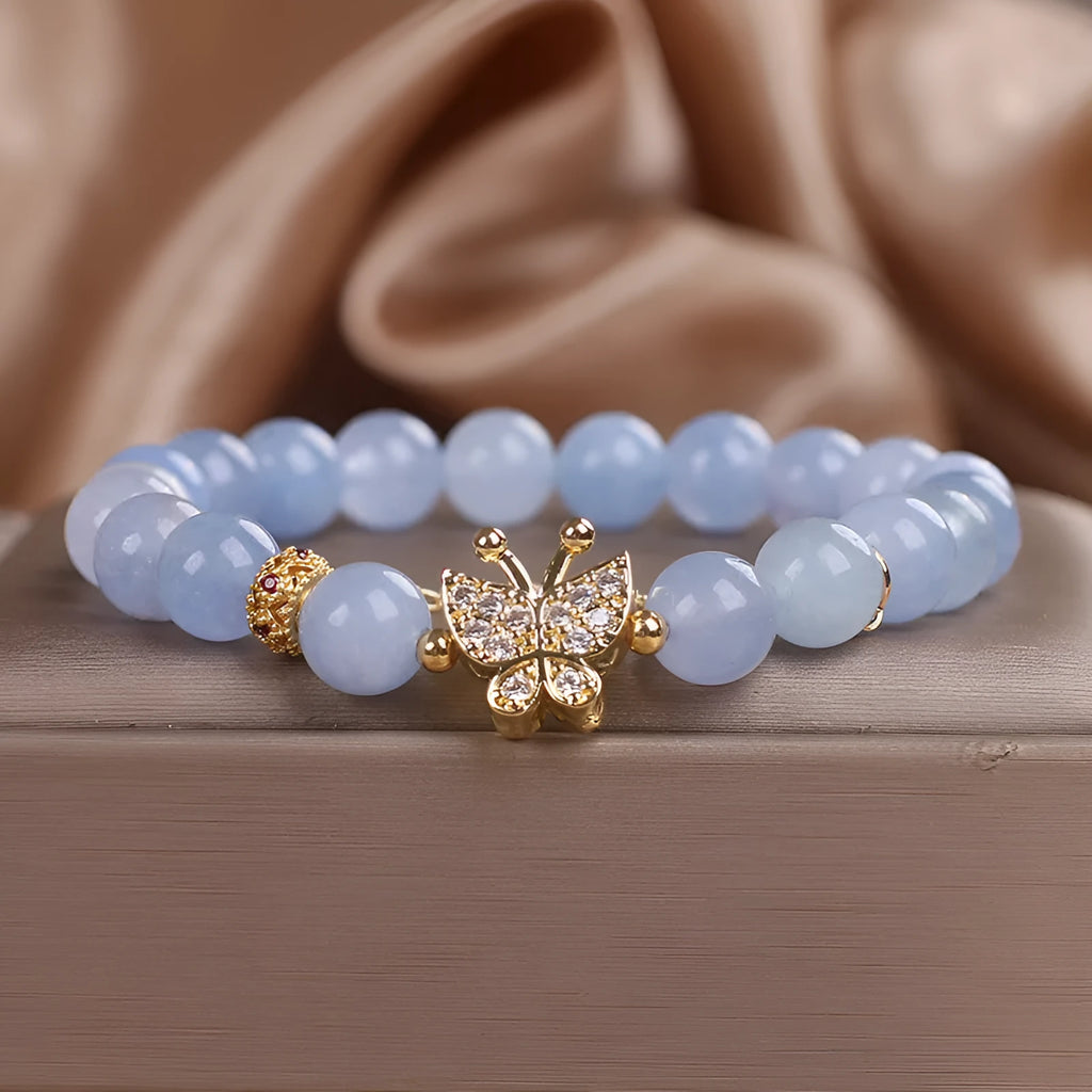Sky blue aquamarine butterfly crystal bracelet with pearls and rhinestones measuring 17cm length