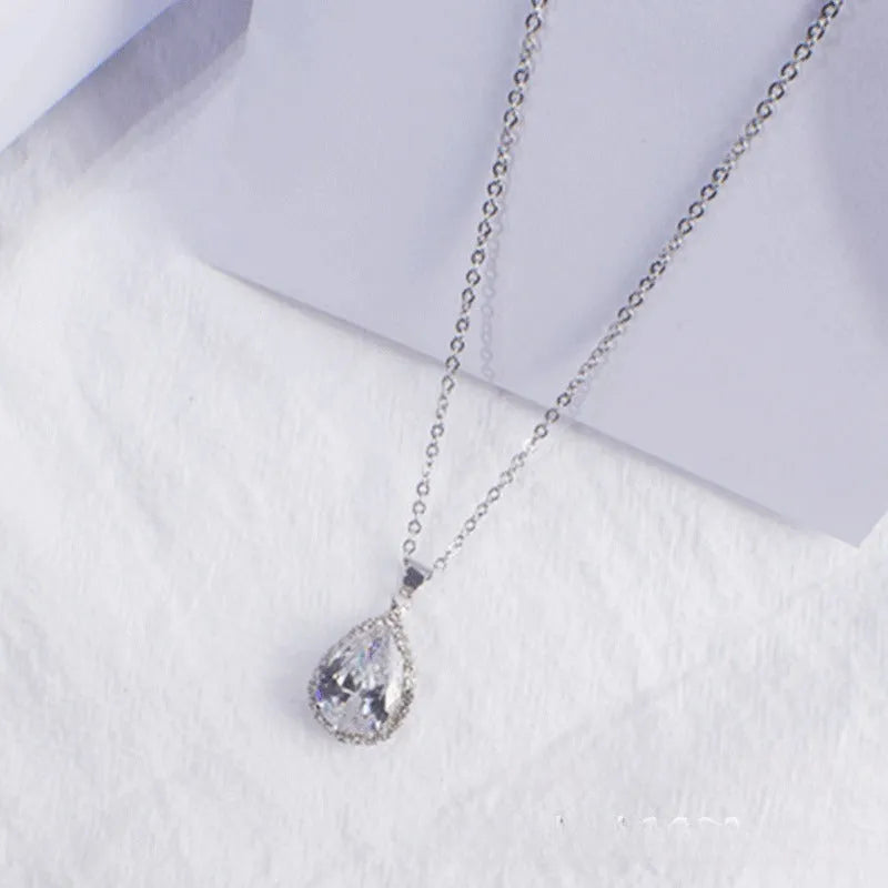 Rose gold geometric water drop pendant necklace with rhinestone inlay