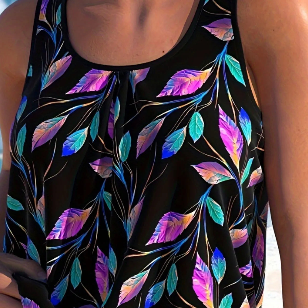 Women's leaf design two-piece swimsuit set in a solid colour, sizes 1XL to 4XL.