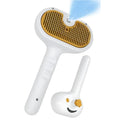 White pet grooming brush with steam function and self-cleaning mechanism for dogs and cats