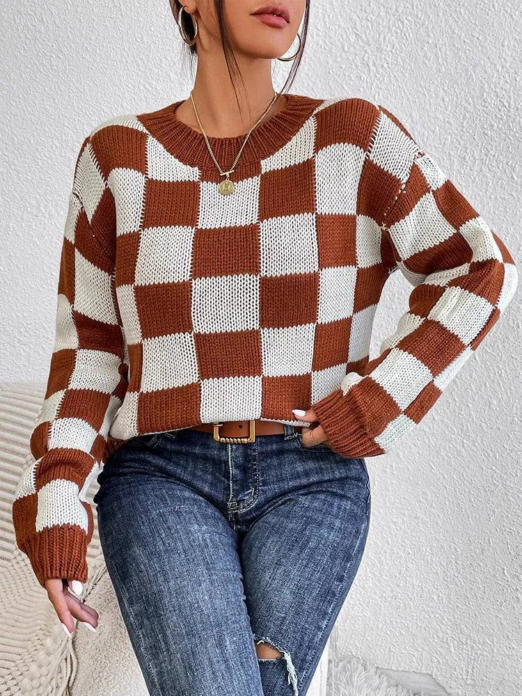 Dark brown women's plaid pullover sweater with long sleeves and a loose fit.