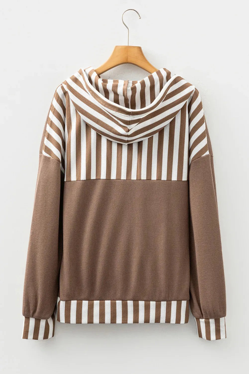 Straw yellow waffle texture hoodie with striped patchwork and a button neck.