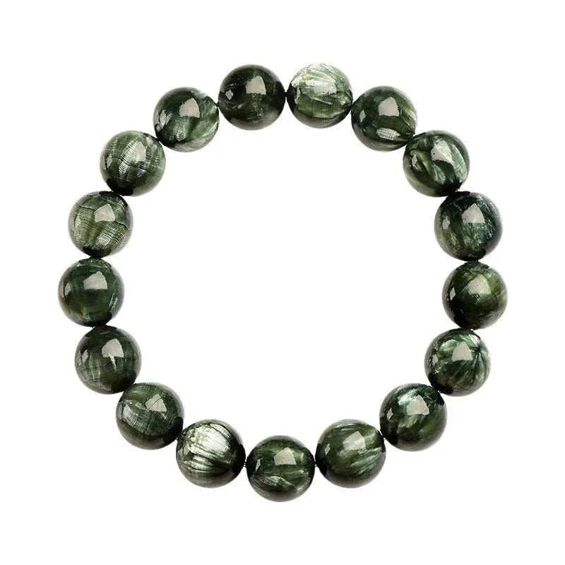 Natural green dragon crystal round bead bracelet with ruyi detail on a white background.