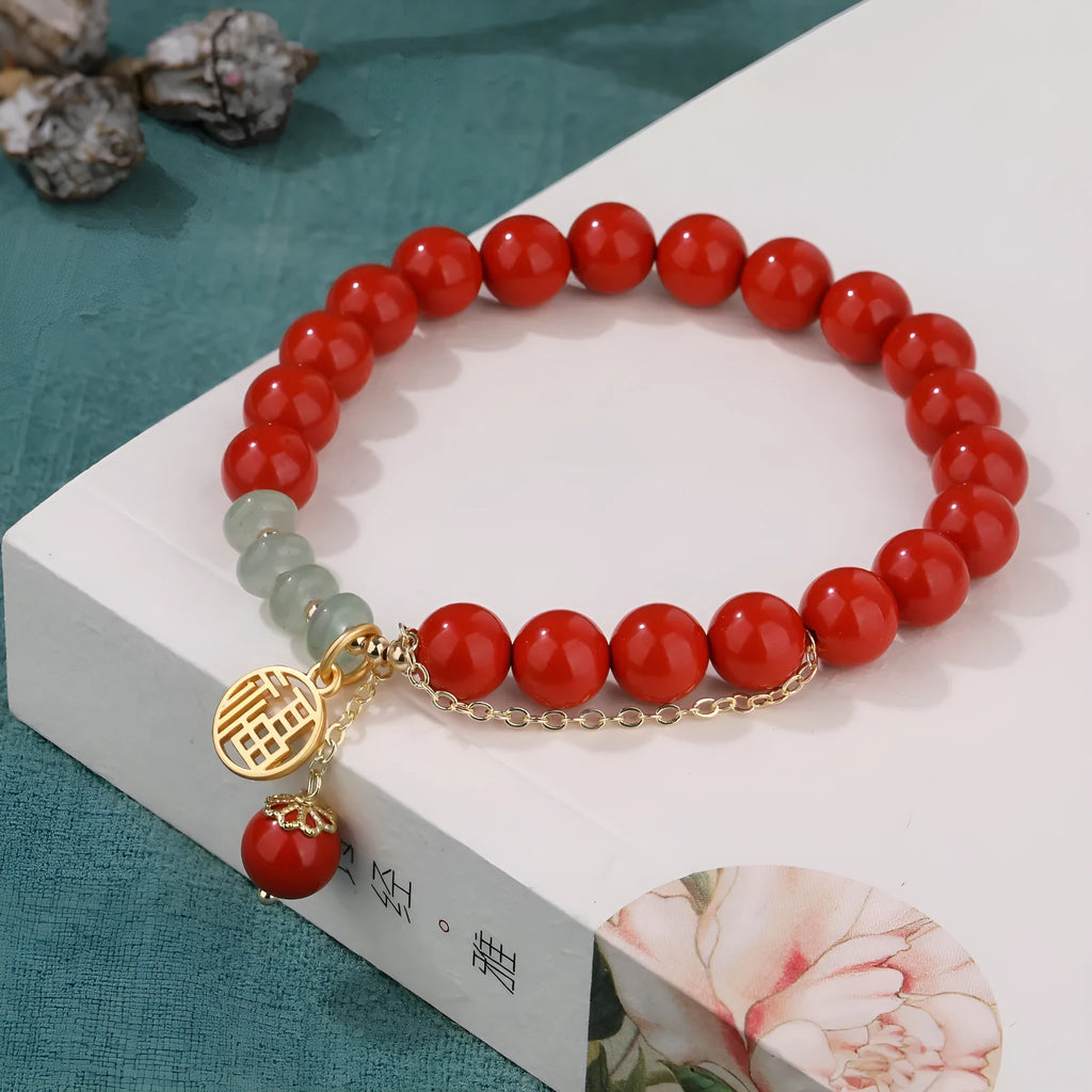 Retro women's red sand cinnabar bracelet with carved fu character and jade spacer