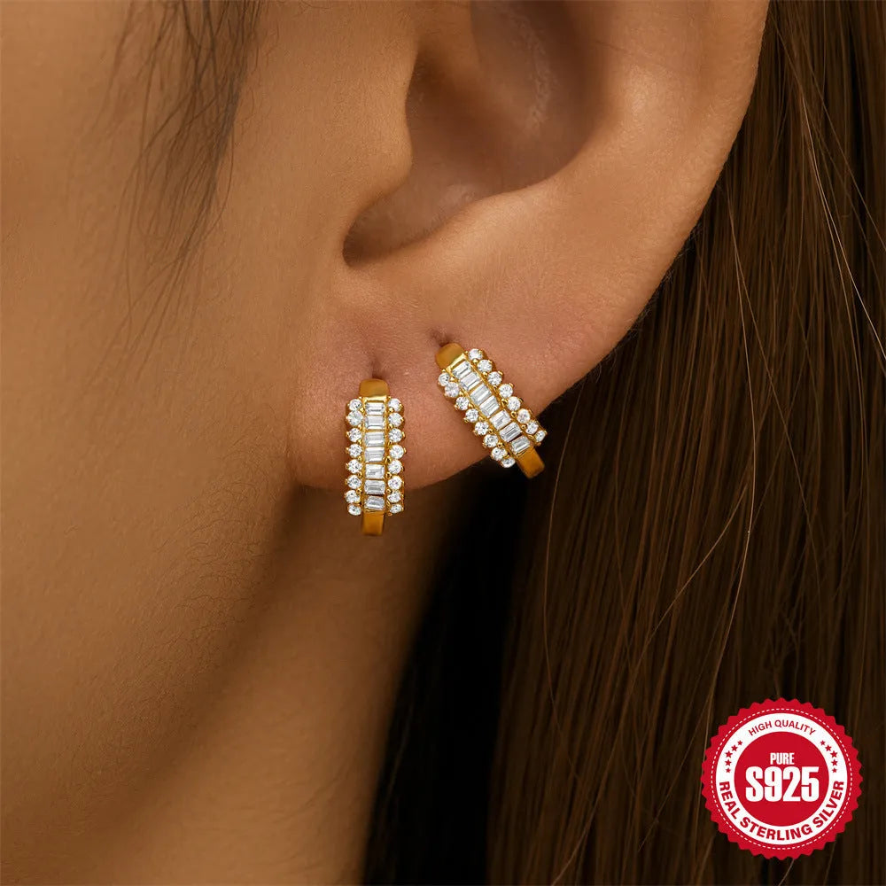 Small round geometric sterling silver stud earrings with diamond accents in gold or silver colour