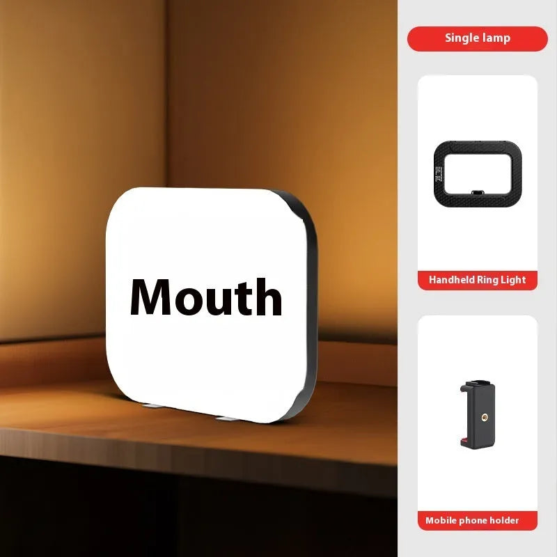 Mobile phone fill light attached to a phone holder on a 50cm metallic desktop bracket.