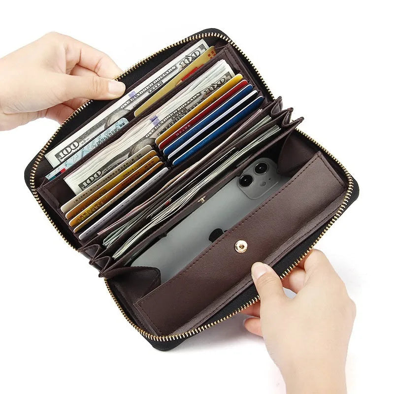 Long genuine leather women's wallet in solid colour with anti-theft card swiping feature
