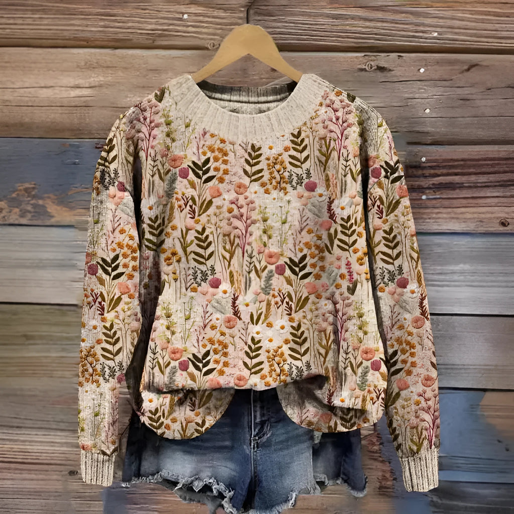 Little Flower digital printed round neck long sleeve sweater on a hanger.