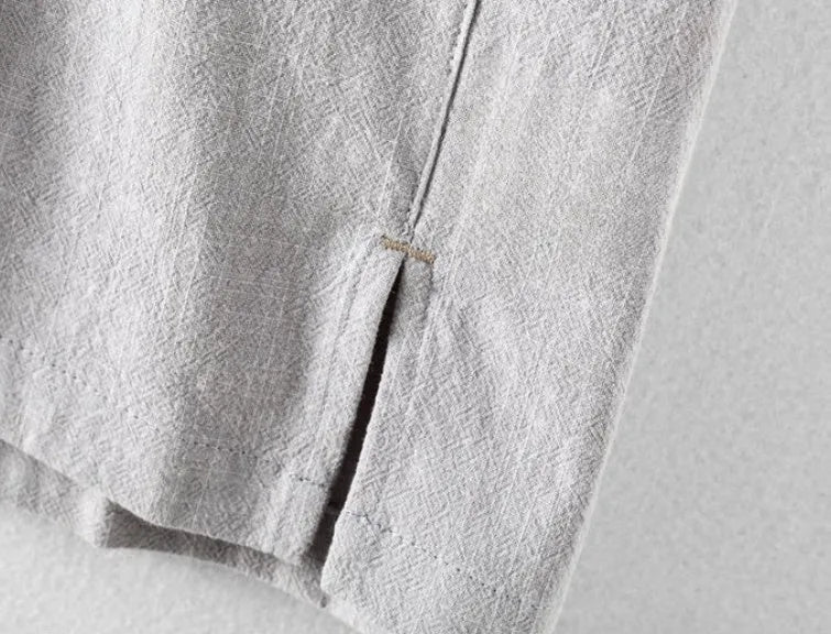 Men's loose fit linen casual shirt in a solid colour, shown in a light gray option.