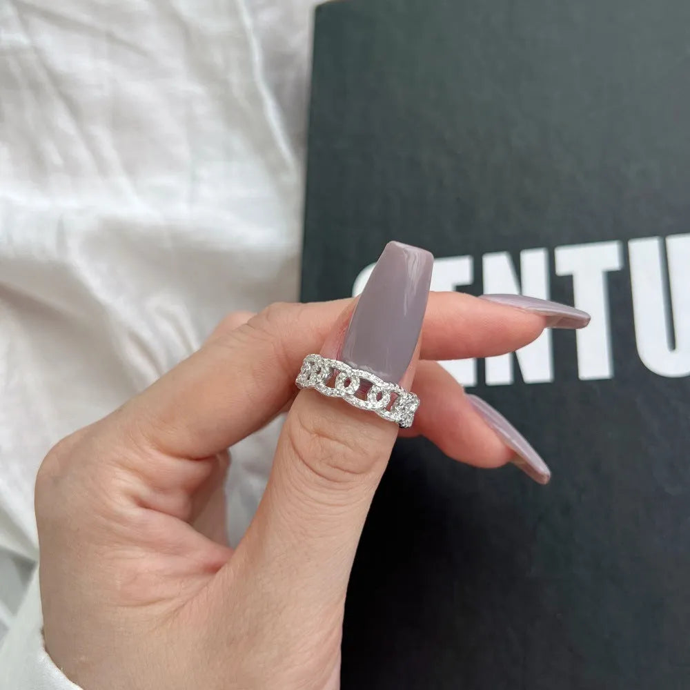 Silver punk chain ring for women with electroplated finish on white background