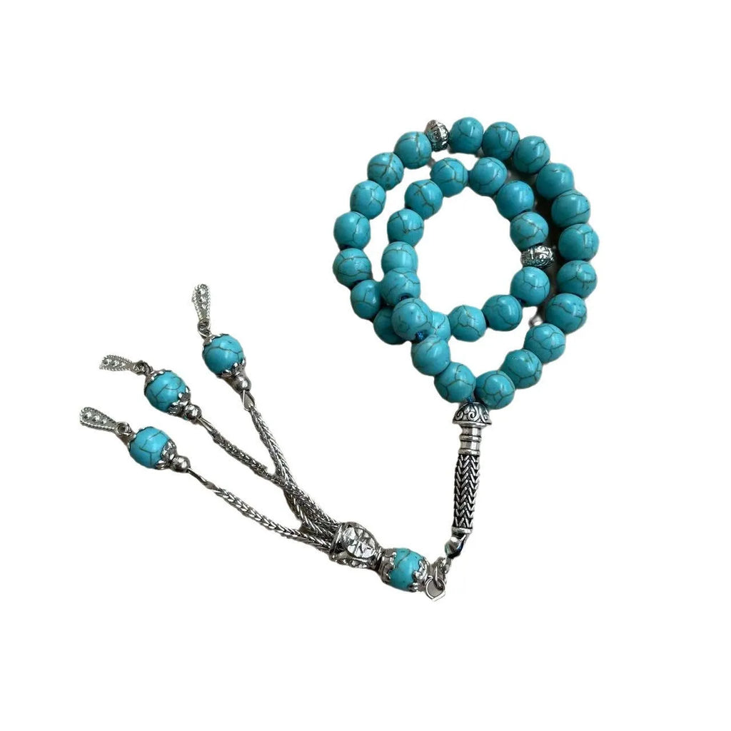 Handmade sky blue stone bead Muslim prayer bracelet for daily worship and dhikr counting.