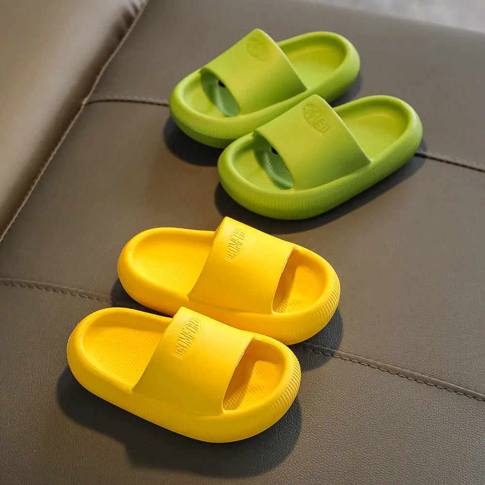 Children's colourful EVA slippers with a textured non-slip sole, shown in a mixed colour selection.