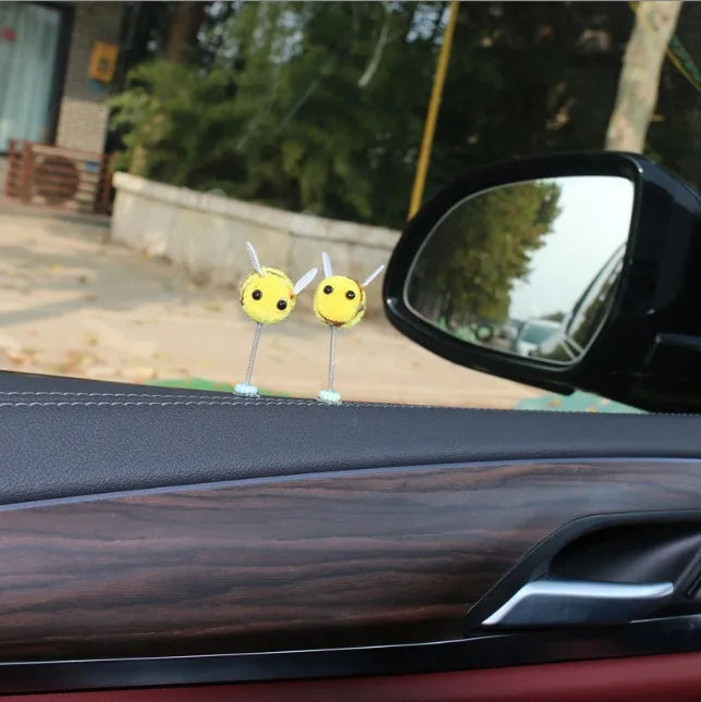 Cartoon bee car decoration with furry texture and swing spring on car dashboard