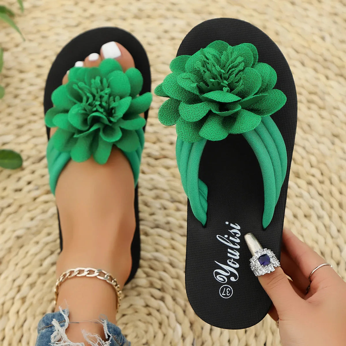 Women's floral flip-flop sandals in beige with a lightweight EVA sole.