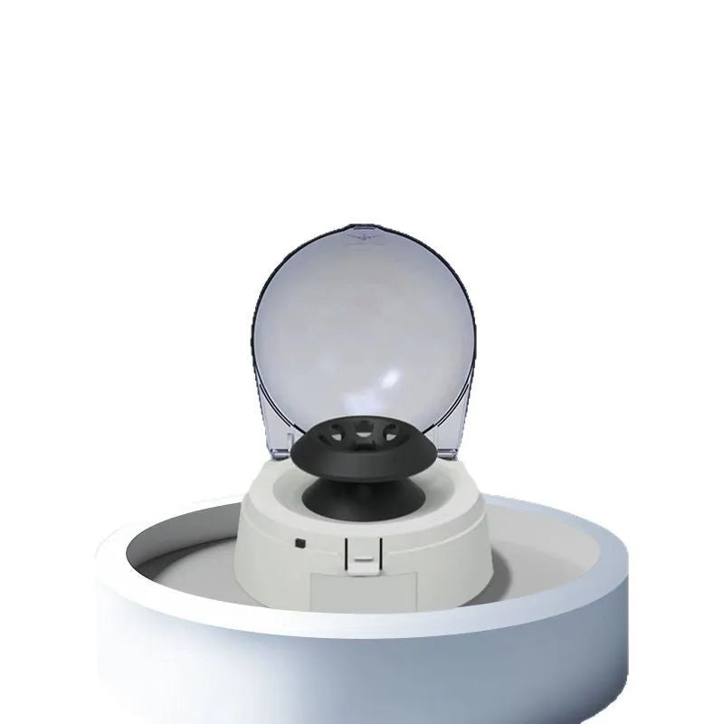 Mini laboratory centrifuge with compact benchtop design measuring 157mm × 170mm × 120mm
