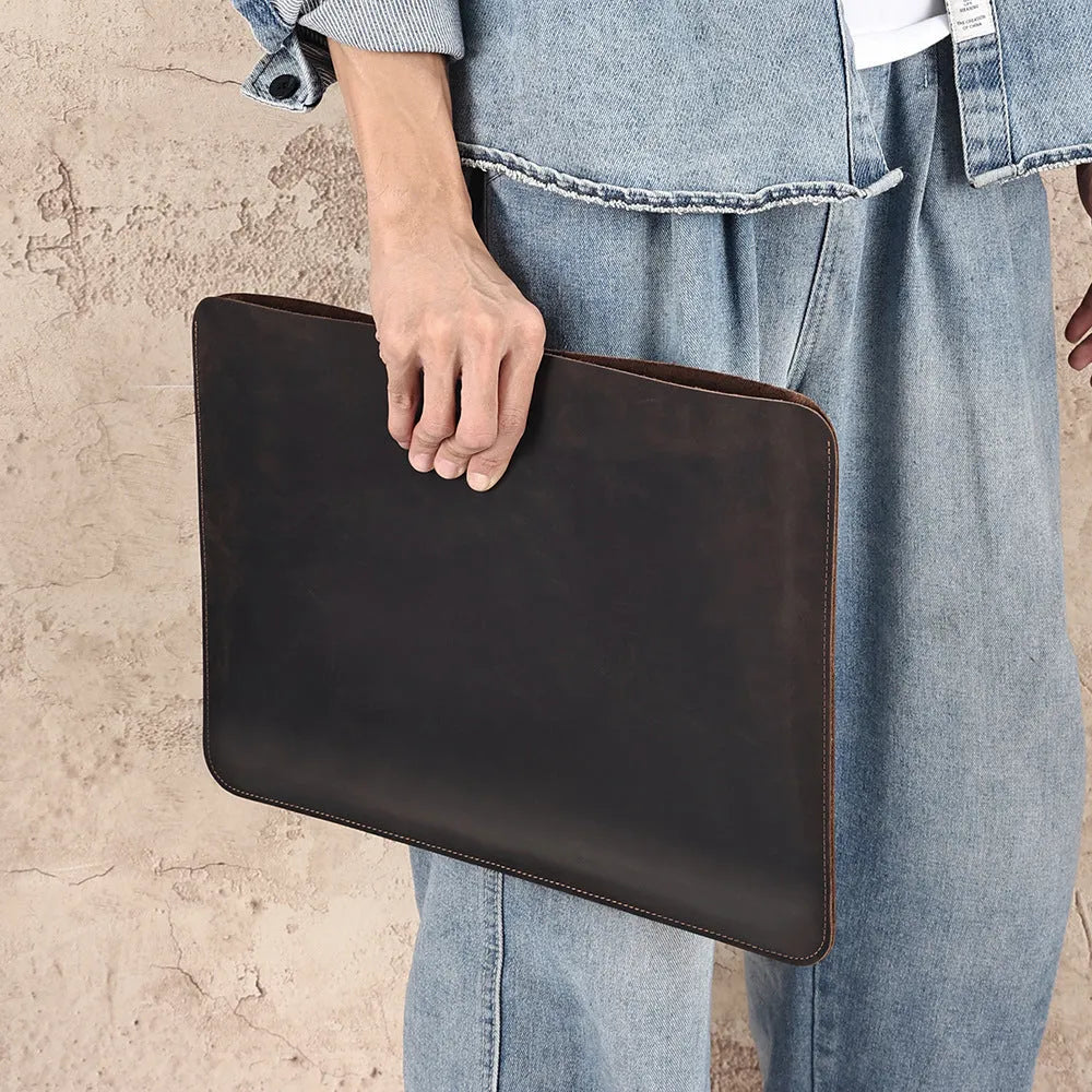 Men's brown crazy horse leather computer liner bag showing solid colour design and genuine leather construction