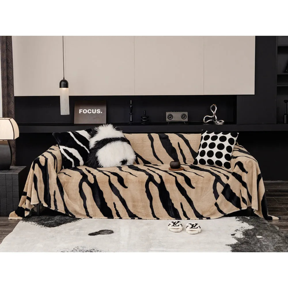 Zebra pattern flannel sofa cover with matching pillowcase in a light luxury style.