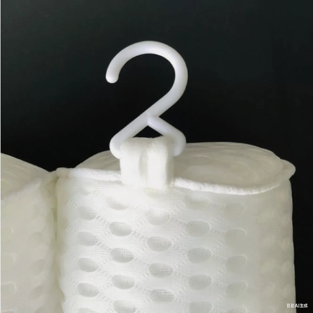 White 4D mesh bathtub pillow with 7 suction cups on a bathtub edge.