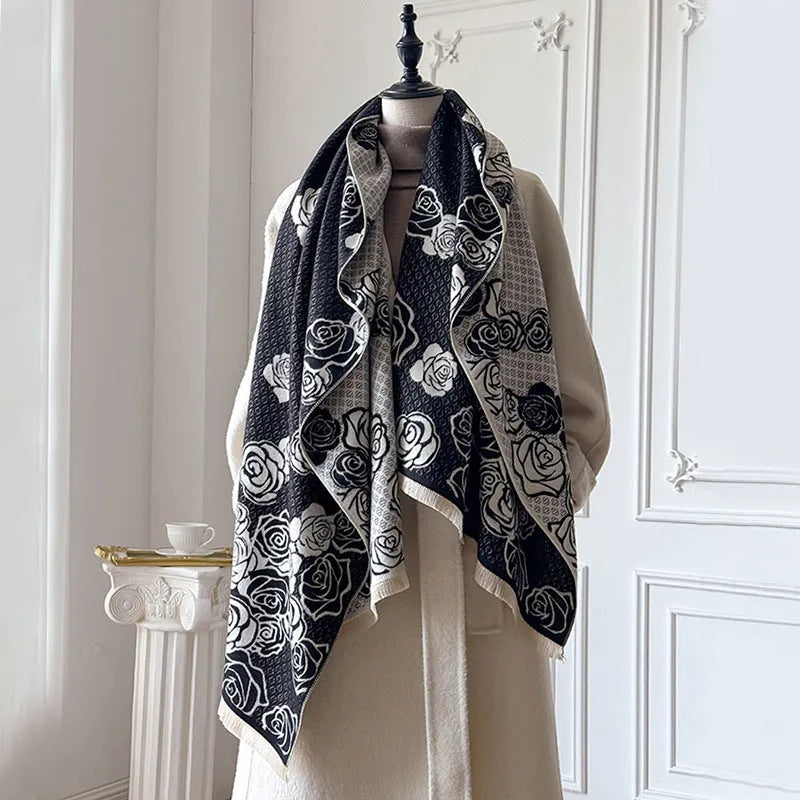 Long grey cashmere-like winter scarf with tassels, shown draped to display its length and texture.