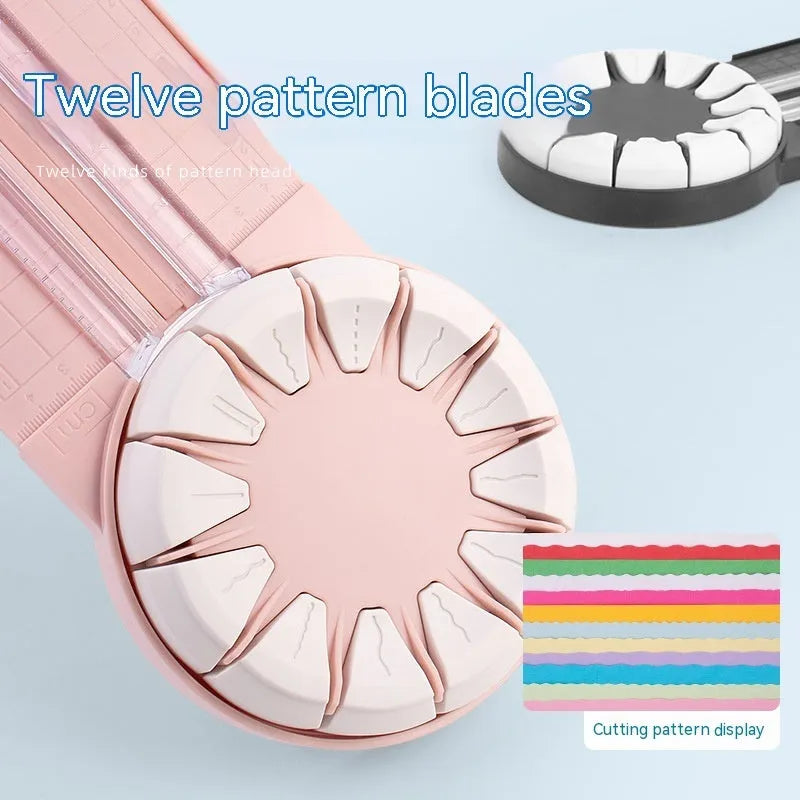Pink plastic 12-in-1 multifunctional paper cutting machine for crafts on a white background.