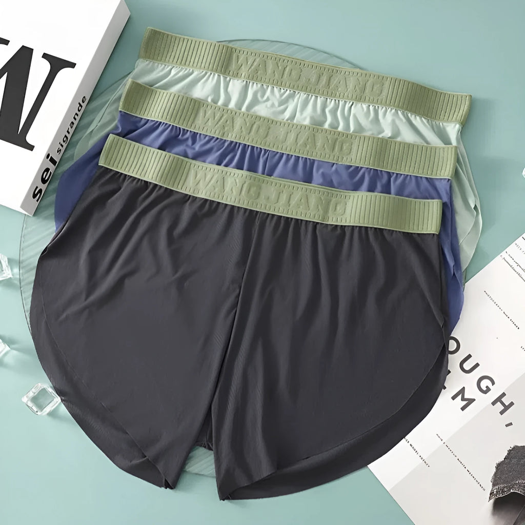 Men's seamless polyester low-waist shorts in light green, loose fit, summer homewear