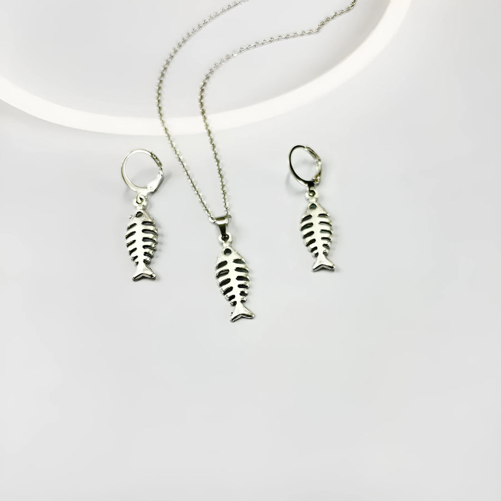 Women's vintage fishbone pendant necklace and matching earrings set with adjustable chain.