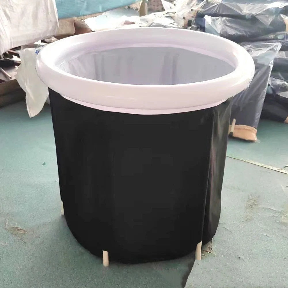 Black inflatable portable ice bath tub with weather lid and accessories for cold water therapy
