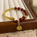 Golden South Red Agate character ingot half bracelet for women in antique style.