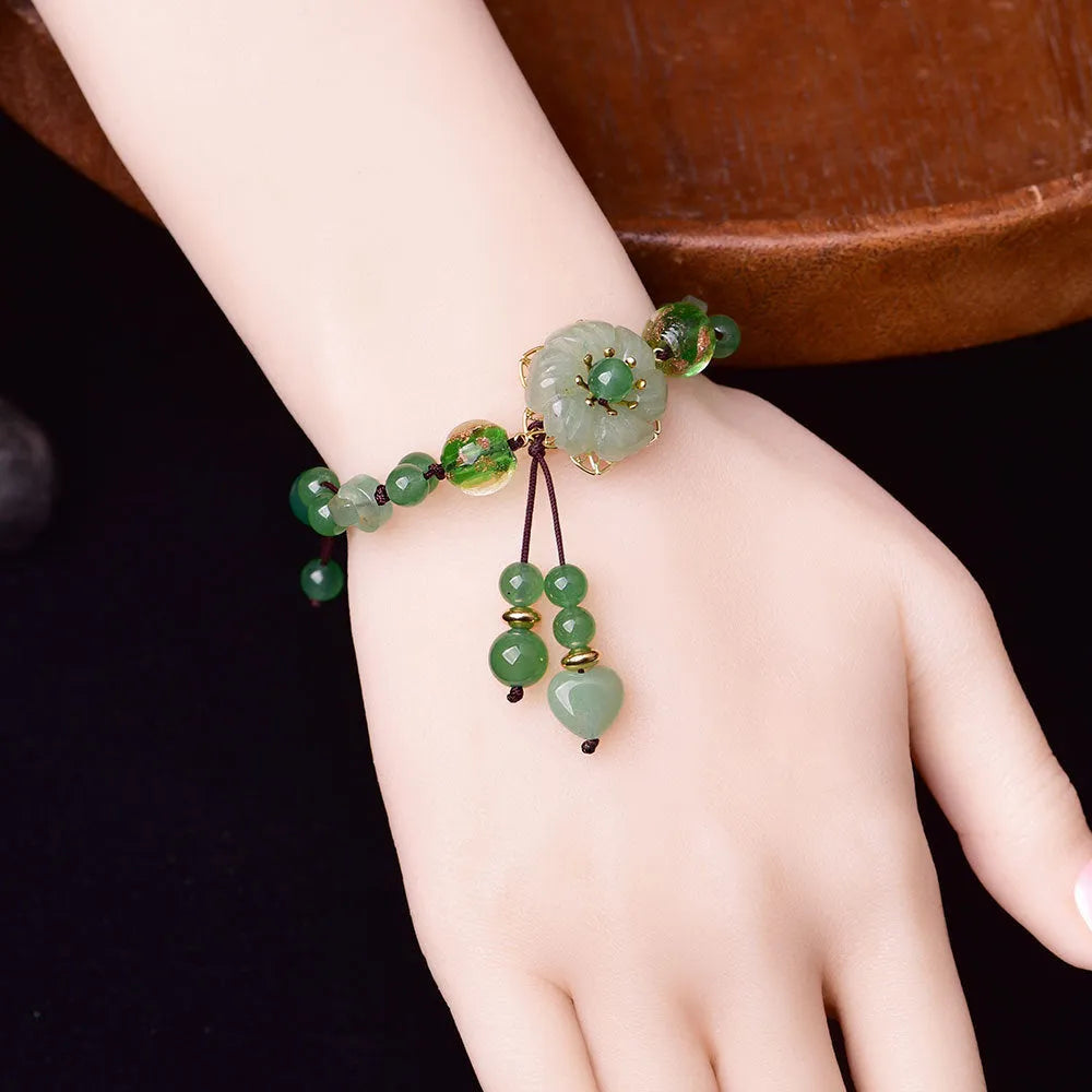 Hand-woven Chinese style bracelet with auspicious patterns and flower design in mixed materials