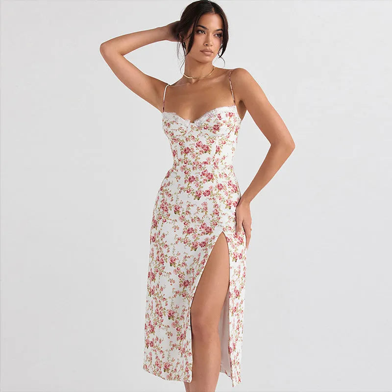 Women's long lace floral print dress with front slit and suspender straps in blue.